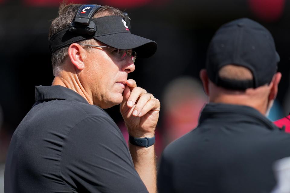 Cincinnati Bearcats head coach Scott Satterfield stands on the sideline late in the fourth quarter of the NCAA Big 12 football game between the Cincinnati Bearcats and the Oklahoma Sooners at Nippert Stadium in Cincinnati on Saturday, Sept. 23, 2023. The Bearcats lost their first Big 12 football game, 20-6, to the Sooners before a sellout crowd.