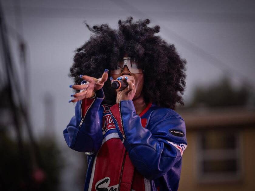 SZA performs at Top Dawg Entertainment's  annual toy drive and concert at the Nickerson Gardens housing projects on Tuesday in Los Angeles.