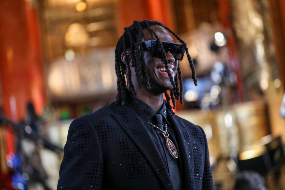 NFL draft prospect Marvin Harrison Jr., a wide receiver who played at Ohio State, walks the red carpet for NFL draft day at the Fox Theatre in Detroit on Thursday, April 25, 2024.