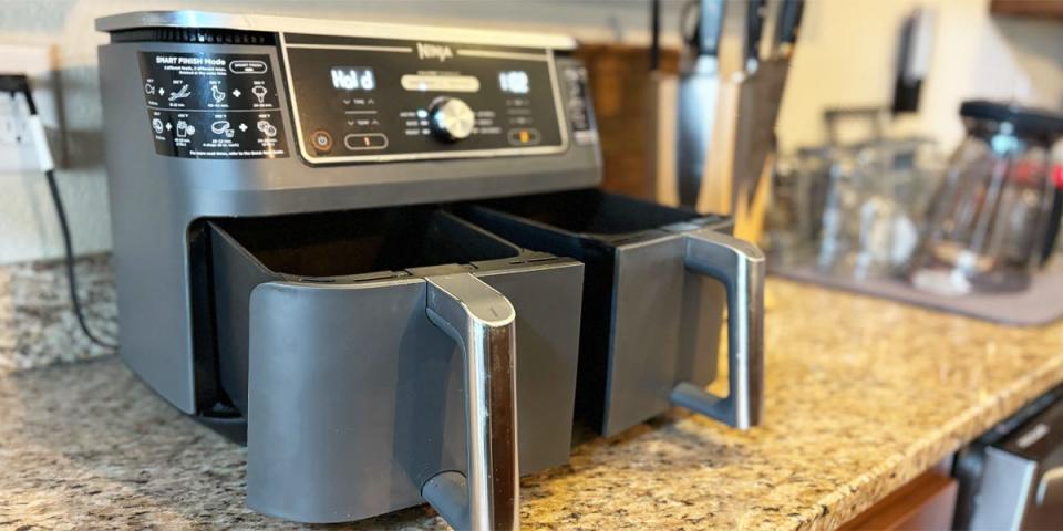 An angled shot from the front of the Ninja Foodi DualZone 2-Basket Air Fryer.