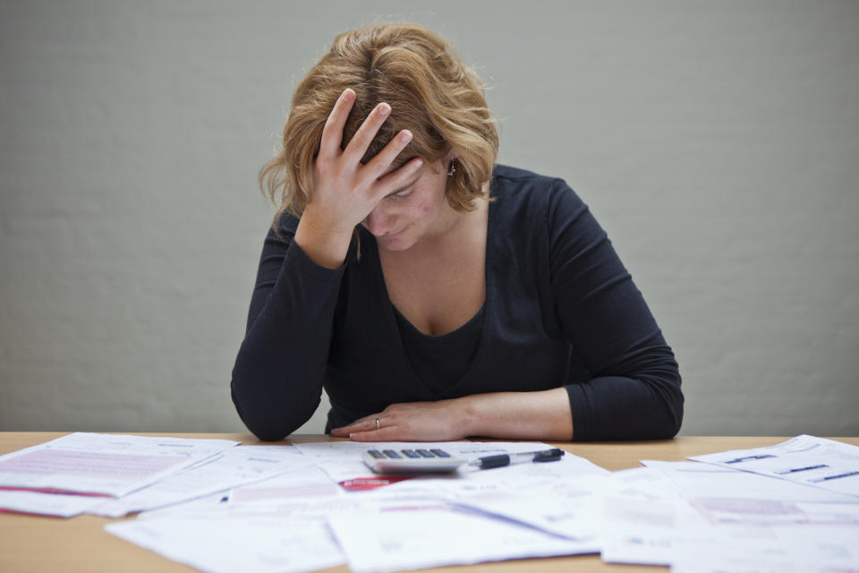 Tens of thousands of UK households are swamped by debt (Getty Images)