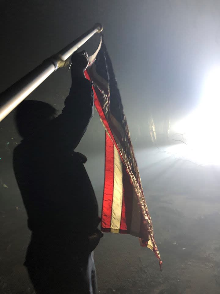 An American flag was the only thing to survive wildfire in this California neighborhood. (Photo: Elk Grove Police Department)