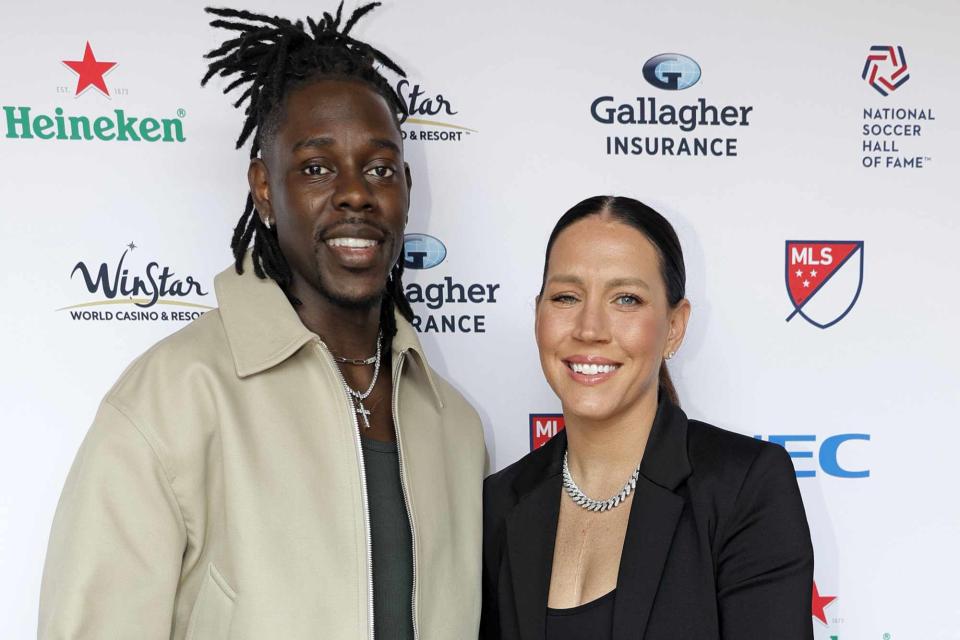 <p>Carmen Mandato/USSF/Getty</p> Lauren Holiday poses with her husband Jrue Holiday, and kids, on the red carpet at Toyota Stadium on May 06, 2023 