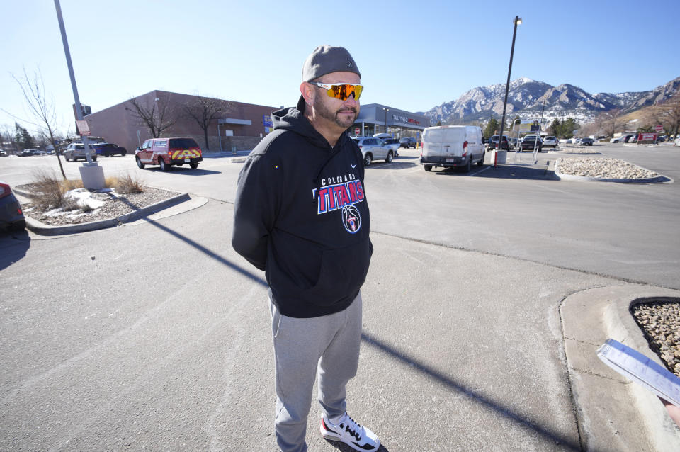 Robert Olds, the uncle of one of the 10 people killed in a shooting in a grocery store on March 22, 2021, speaks outside the renovated King Soopers after taking part in a tour for victims' families to see the site Tuesday, Feb. 8, 2022, in Boulder, Colo. The store will reopen to the public on Wednesday, Feb. 9, after major renovations. (AP Photo/David Zalubowski)