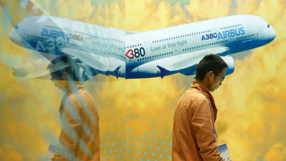 <div class="inline-image__caption"><p>A man walks past an Airbus A380 poster at the Beijing International Aviation Expo in Beijing on Sept. 17, 2015.</p></div> <div class="inline-image__credit">Wang Zhao/Getty</div>