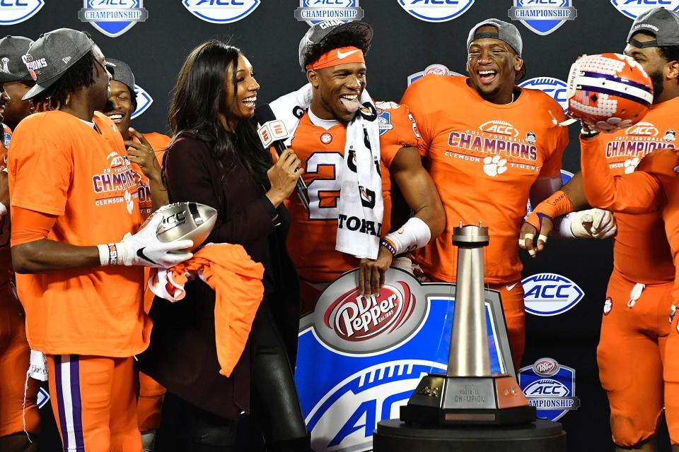 Maria Taylor with Clemson football players.