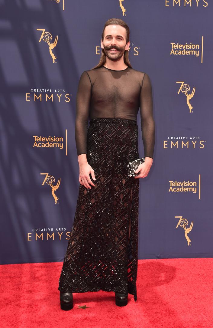 Jonathan Van Ness wears a dress with a sheer top at the Emmys in 2018.