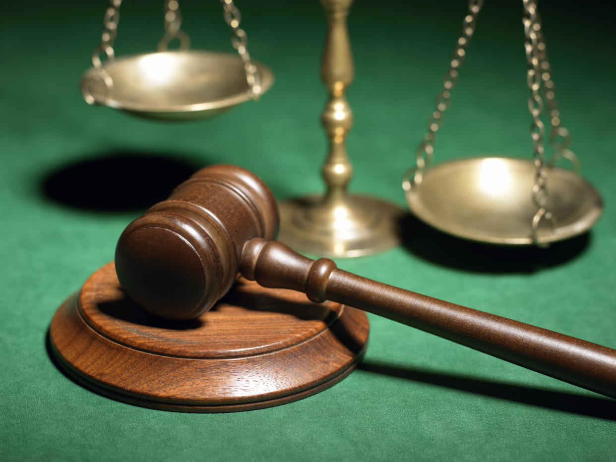 Photo of court gavel and scale. (Photo: Thinkstock)