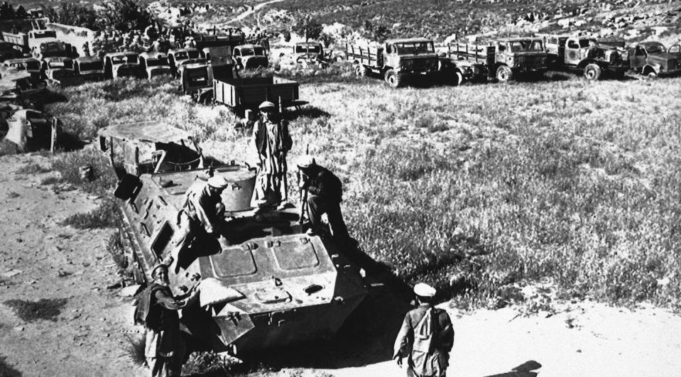 Afghan rebels examine a Soviet-built armored personnel carrier and scores of other military vehicles left behind when the Mujahedeen fighters overran a Soviet-Afghan garrison. <a href="http://www.apimages.com/metadata/Index/Watchf-Associated-Press-International-News-AFGH-/02e15ed8028143c1b5d5a6c7437cf45c/6/0" rel="nofollow noopener" target="_blank" data-ylk="slk:AP Photo/Joe Gaal;elm:context_link;itc:0;sec:content-canvas" class="link ">AP Photo/Joe Gaal</a>