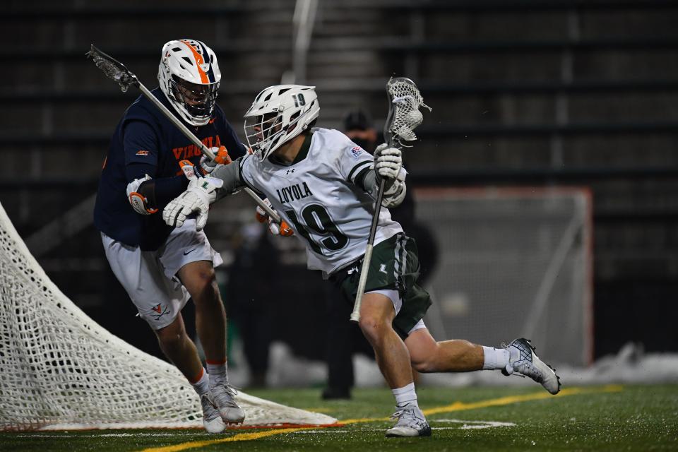 Aidan Olmstead in action for the Loyola University Maryland men's lacrosse team.