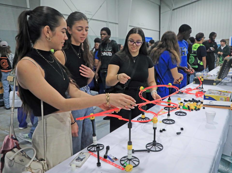 High school students work hands-on with recruiters from construction, engineering and transportation industry agencies during the two-day career day fair at the Volusia County Fairgrounds in DeLand, Thursday, Jan. 25, 2024.