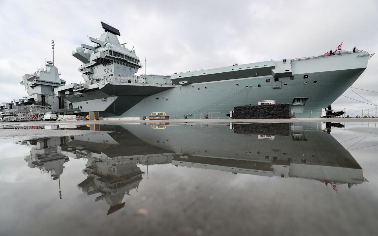 HMS Queen Elizabeth, as final preparations are made prior to her setting sail for the US to undergo flight trials with the F35B for the first time - PA