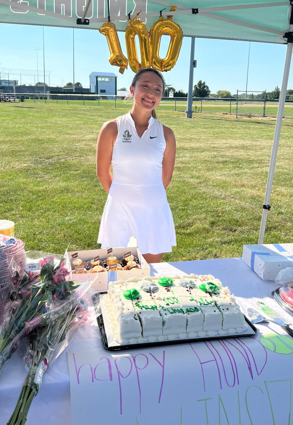 Richwoods High School senior tennis player Theresa Bartelme was honored by her team after securing her 100th varsity victory on Sept. 4, 2024.