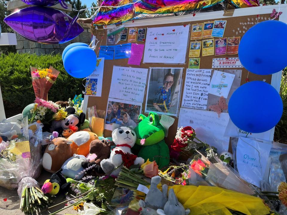 A memorial to 10-year-old Oliver Stratton, who was killed in an Aug. 2 crash near the intersection, is displayed at the southeast corner of River Pass Road and Saddle Horn Drive in Timnath on Aug. 4.