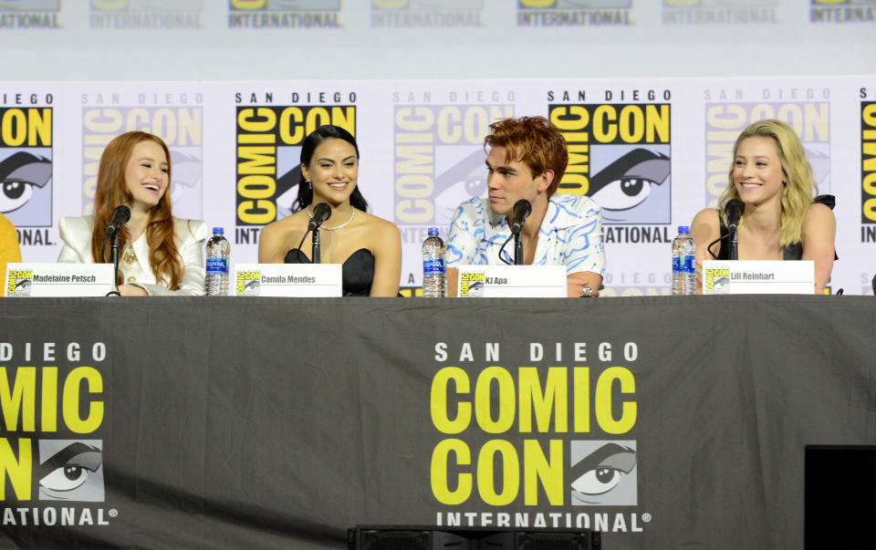 SAN DIEGO, CALIFORNIA - JULY 21: (L-R) Madelaine Petsch, Camila Mendes, KJ Apa and Lili Reinhart speak at the "Riverdale" Special Video Presentation and Q&A during 2019 Comic-Con International at San Diego Convention Center on July 21, 2019 in San Diego, California. (Photo by Albert L. Ortega/Getty Images)