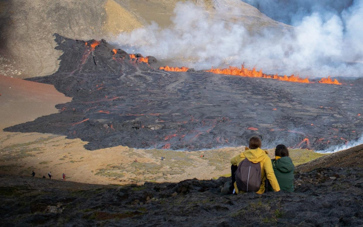 Spectators flock to dramatic volcanic eruption in Iceland - JEREMIE RICHARD /AFP