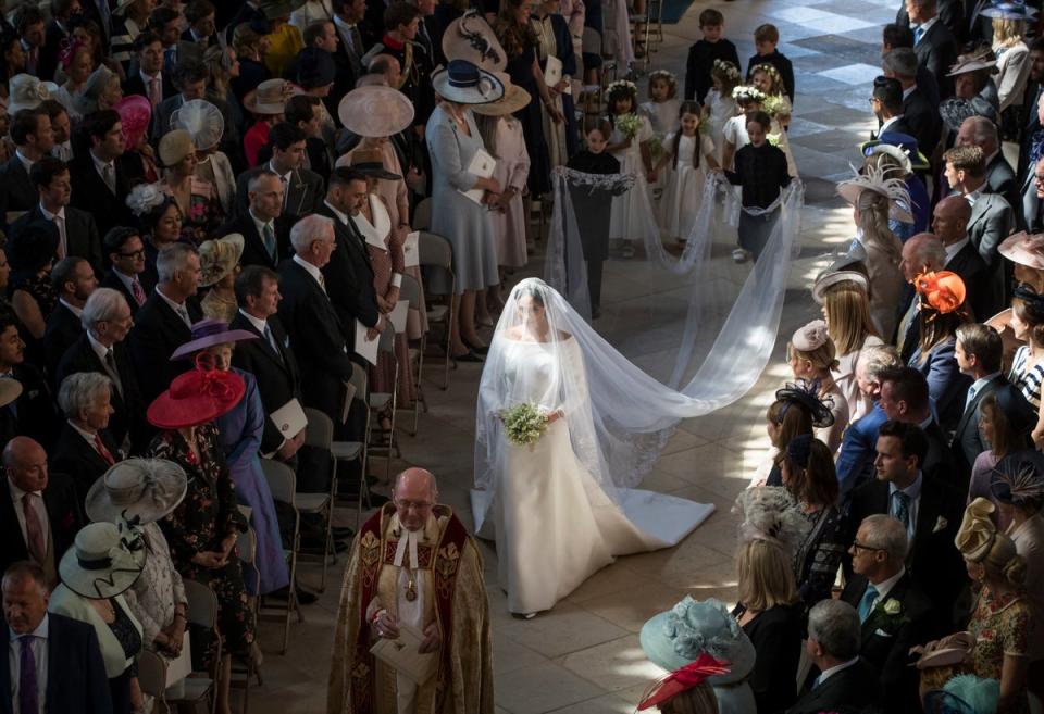 Meghan walks down the aisle as she arrives in St George’s Chapel at Windsor Castle for her wedding (Danny Lawson/PA) (PA Archive)