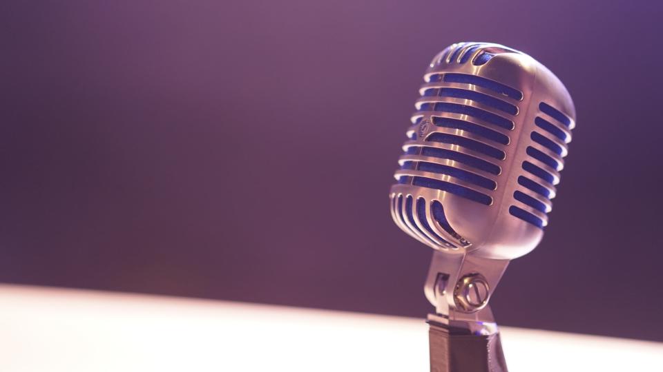 A condensor microphone on a table.