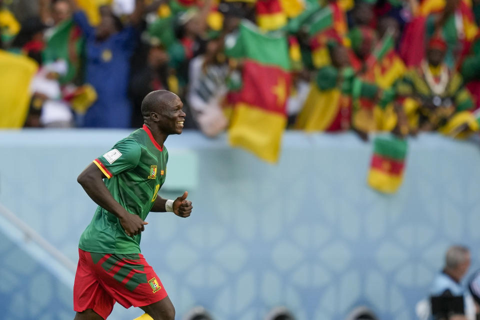 Cameroon's Vincent Aboubakar celebrates after scoring his side's second goal during the World Cup group G soccer match between Cameroon and Serbia, at the Al Janoub Stadium in Al Wakrah, Qatar, Monday, Nov. 28, 2022. (AP Photo/Frank Augstein)