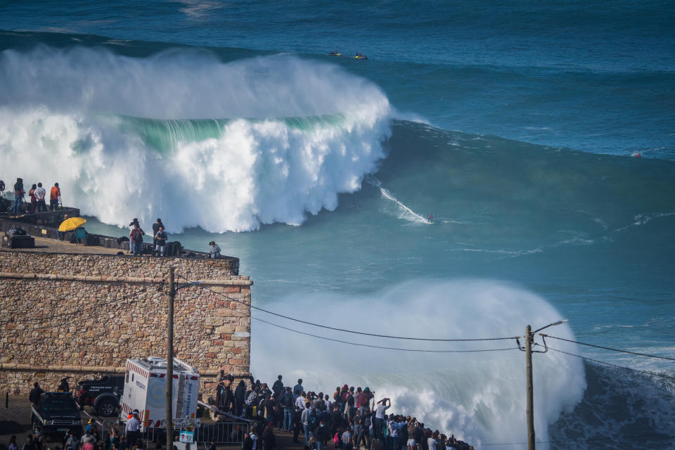 NAZARE, PORTUGAL - 2020/10/29: Big wave surfer Caio Vaz from Brazil rides a wave during a tow surfing session at Praia do Norte on the first big swell of winter season. (Photo by Henrique Casinhas/SOPA Images/LightRocket via Getty Images)