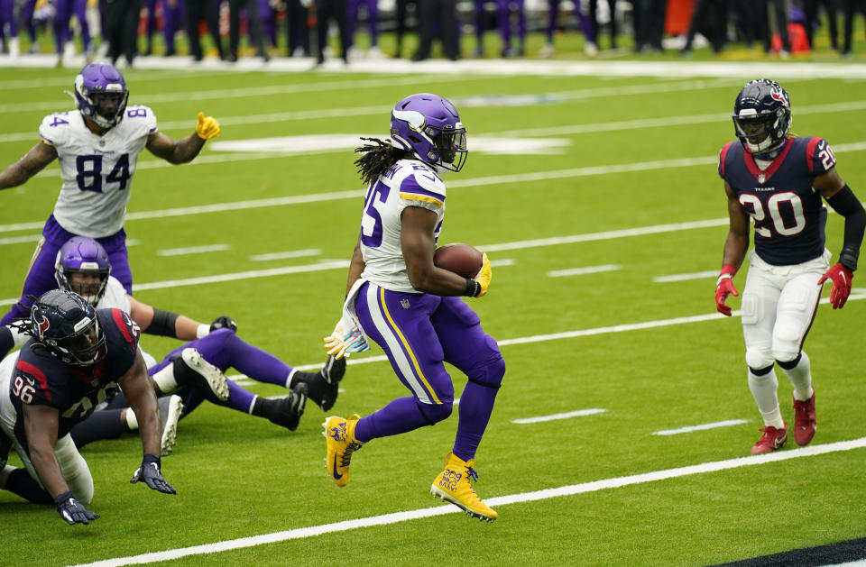 Minnesota Vikings running back Alexander Mattison (25) runs for a touchdown against the Houston Texans during the second half of an NFL football game Sunday, Oct. 4, 2020, in Houston. (AP Photo/David J. Phillip)