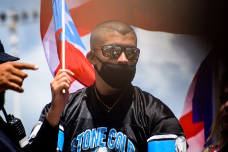 Trap artist Bad Bunny is seen during the national strike calling for the resignation of Governor Ricardo Rossello, in San Juan