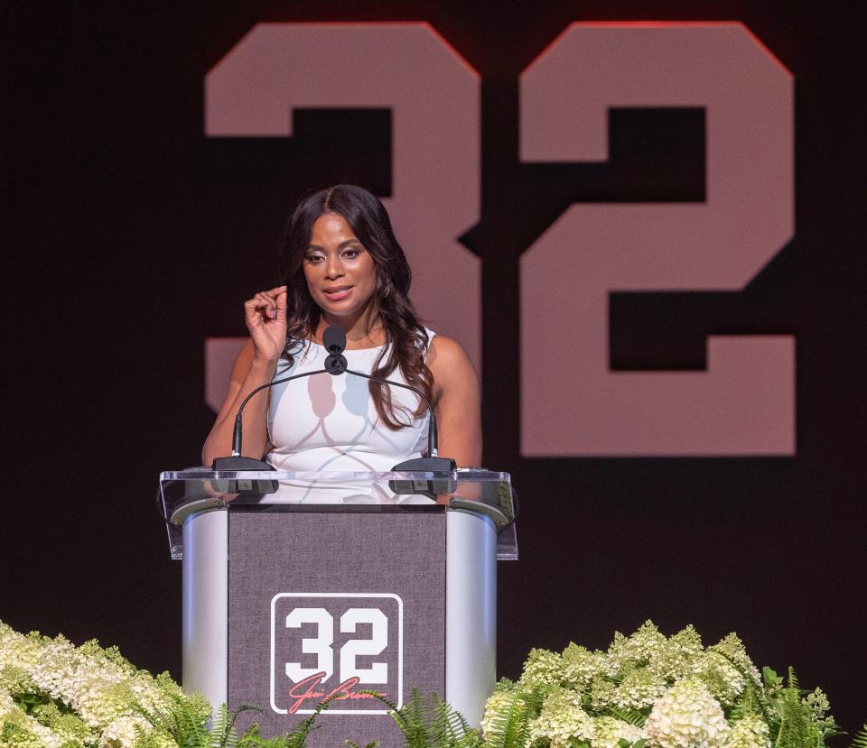 Monique Brown, wife of Jim Brown, speaks at a celebration of life for Jim Brown held Thursday at McKinley High School.