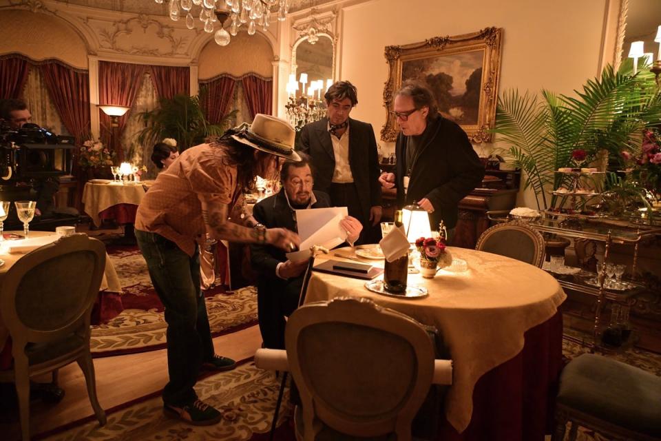 Johnny Depp and Al Pacino discuss a scene in their upcoming film ‘Modi’. Pacino plays real-life French art collector Maurice Gangnat in the film. (Sam Sarkar)