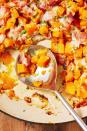 <p>No matter what the centerpiece of your meal is, this cheesy <a href="https://www.delish.com/cooking/g3003/butternut-squash/" rel="nofollow noopener" target="_blank" data-ylk="slk:butternut squash" class="link ">butternut squash</a> skillet is sure to steal the show. The balance of sweet, salty, and creamy is EXTREMELY delicious.<br><br>Get the <strong><a href="https://www.delish.com/cooking/recipe-ideas/recipes/a56379/cheesy-bacon-butternut-squash-recipe/" rel="nofollow noopener" target="_blank" data-ylk="slk:Cheesy Bacon Butternut Squash recipe" class="link ">Cheesy Bacon Butternut Squash recipe</a></strong>.</p>