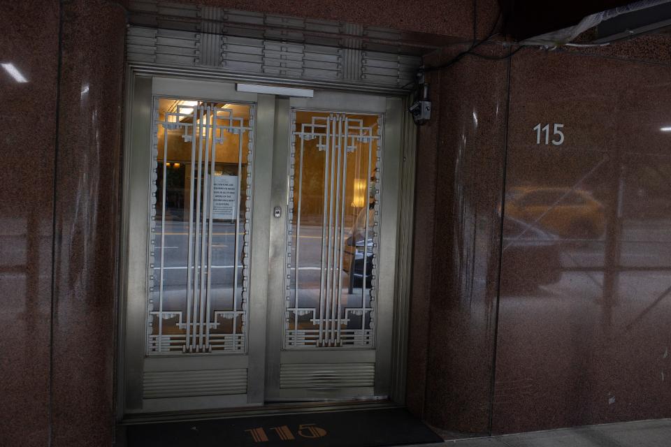 A fancy doorway of a New York City apartment.