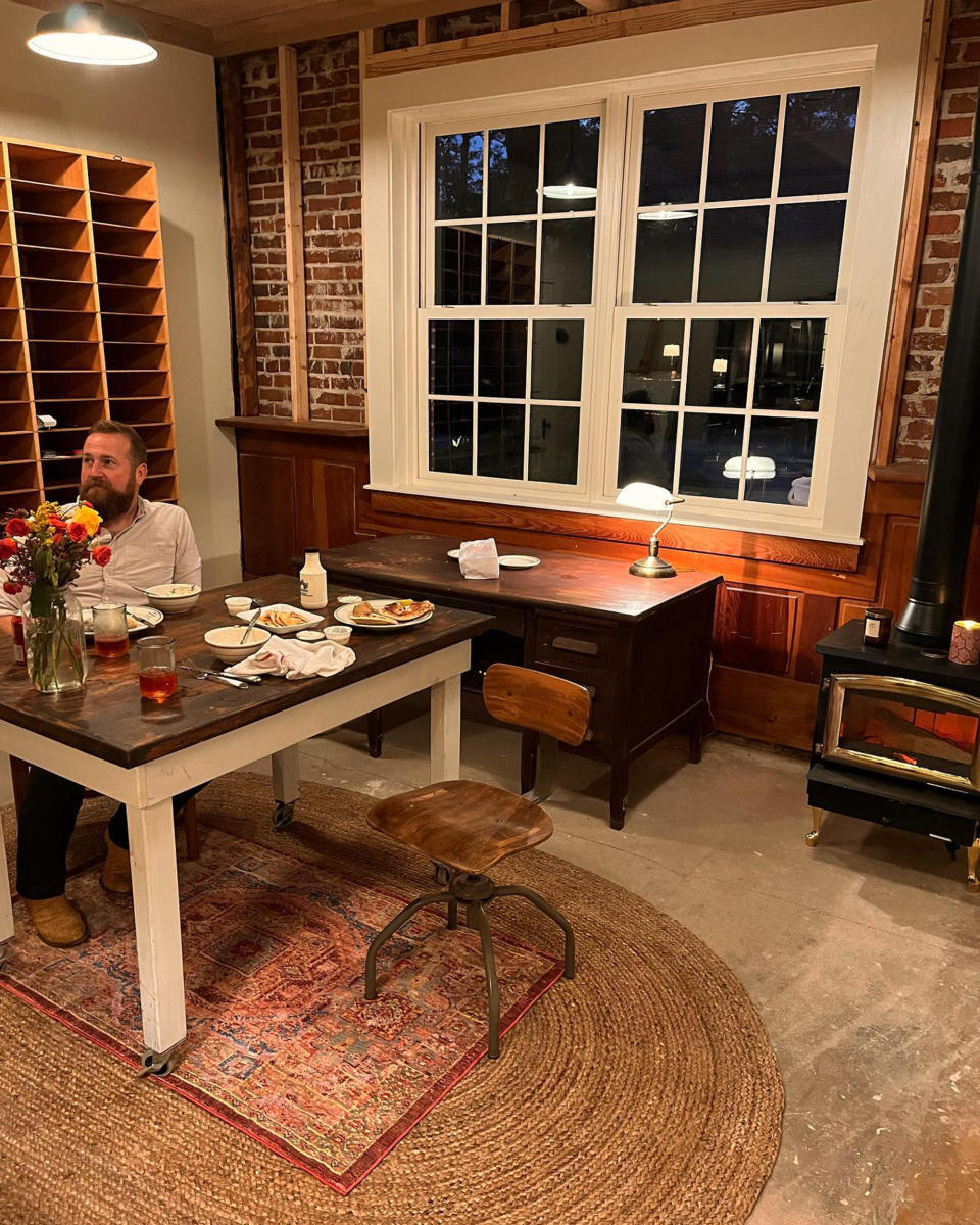 The birthday girl shared a snapshot of her husband in the newly renovated barn. (@erinapier via Instagram)