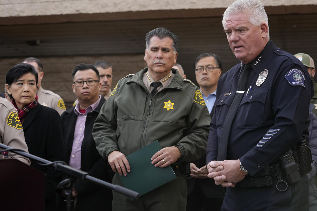 Los Angeles County Sheriff Robert Luna, center, and Monterey Park Chief of Police Scott Wiese, far right, brief the media outside the Civic Center in Monterey Park, Calif., Sunday, Jan. 22, 2023. At left, Rep. Judy Chu, and Monterrey Park Mayor Henry Lo. A mass shooting at a Los Angeles-area ballroom dance club following a Lunar New Year celebration, set off a manhunt for the suspect. (AP Photo/Damian Dovarganes)