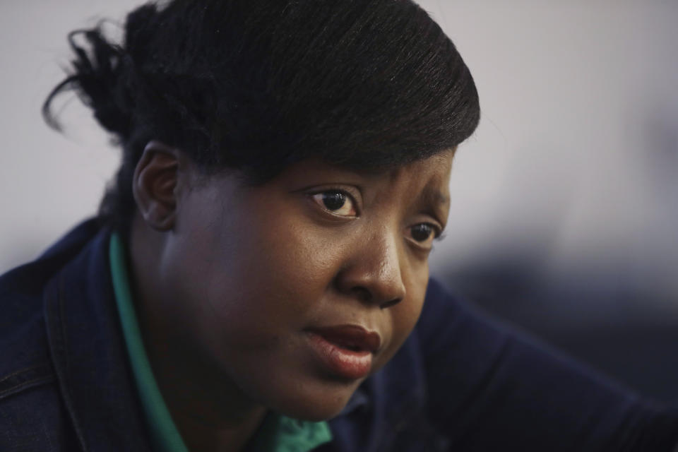 Marie, 35, of Haiti, speaks about seeking treatment in the United States for her 13-year-old sick son during a news conference, Monday, Aug. 26, 2019, in Boston. Doctors and immigrant advocates say federal immigration authorities are unfairly ordering foreign born children granted deferred action for medical treatment to return to their countries. (AP Photo/Elise Amendola)