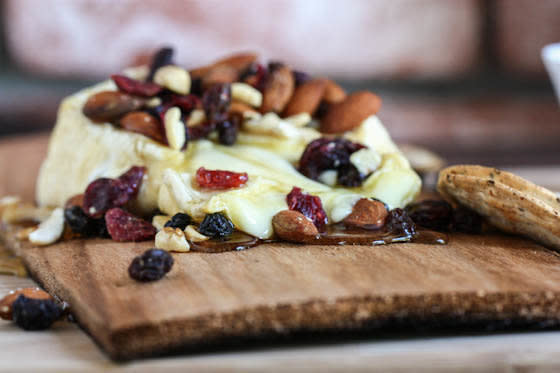 <strong>Get the <a href="http://www.eatliverun.com/grilled-brie-with-honey-and-trail-mix/">Grilled Brie With Honey And Trail Mix recipe</a> by Eat, Live, Run</strong>