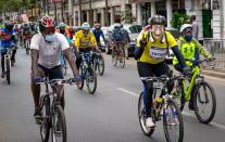 Members of the Nairobi chapter of Critical Mass cycle as they commemorate a friend who was killed while cycling in Nairobi