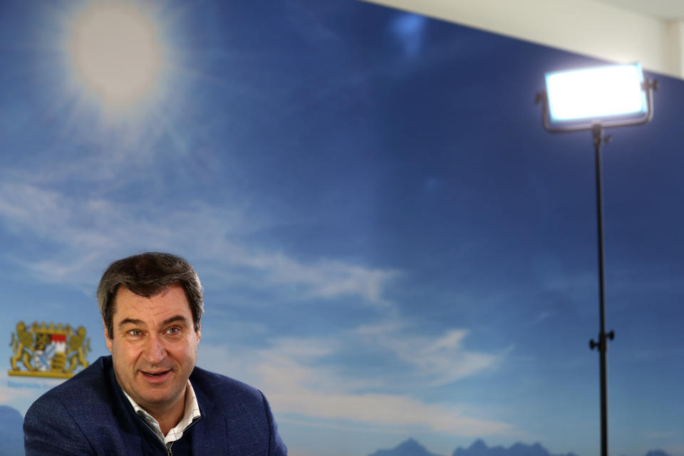 Bavarian state governor Markus Soeder attends an Associated Press interview in Nuremberg, Germany, Thursday, Feb. 18, 2021. Markus Soeder is many things: state governor of Bavaria, Star Trek fan, a conservative for whom combating climate change is an article of faith. The question Germans are asking now is: can the 54-year-old win enough backing across the political spectrum to succeed Angela Merkel as chancellor in September. (AP Photo/Matthias Schrader)