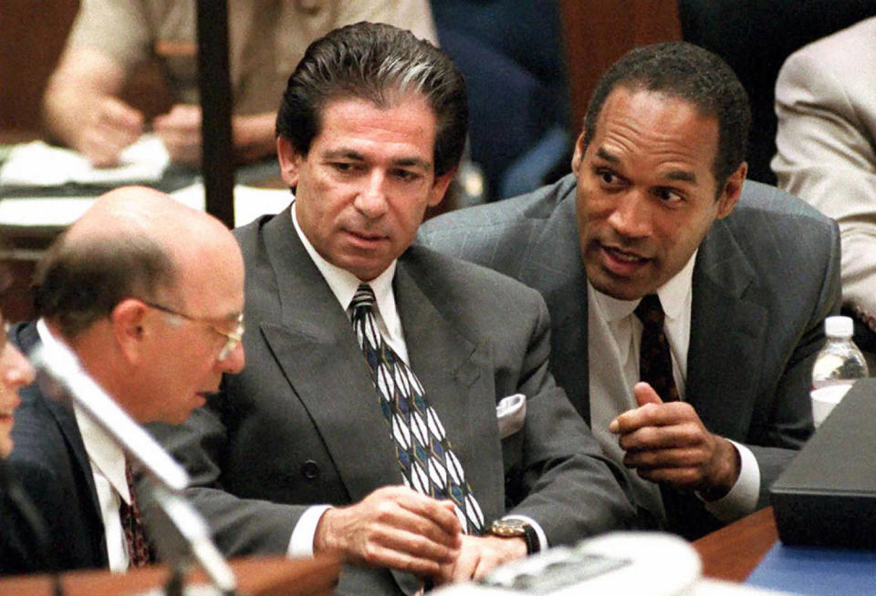 O.J. Simpson (R) consults with friend Robert Kardashian (C) and Alvin Michelson (L) (Vince Bucci / AFP via Getty Images)