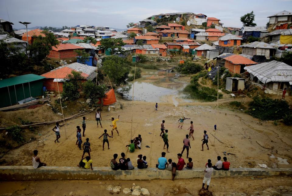 FILE- In this Aug. 27, 2018 file photo, Rohingya refugees play at Balukhali Refugee Camp in Bangladesh. Officials from the U.N. refugee agency and Bangladesh's government say few Muslim Rohingya refugees have responded to plans for their repatriation to Myanmar, and all who did say they don't want to go back. (AP Photo/Altaf Qadri, File)