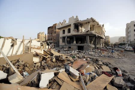 Rubble of houses destroyed by an air raid is seen in Sanaa April 26, 2015. REUTERS/Khaled Abdullah