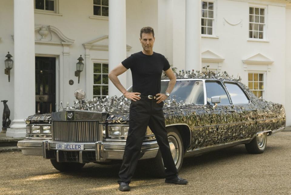 uri geller at home berkshire england 2008 uri with his custom built 1976 cadillac encrusted with over 5,000 pieces of contorted and bend spoons and cutlery