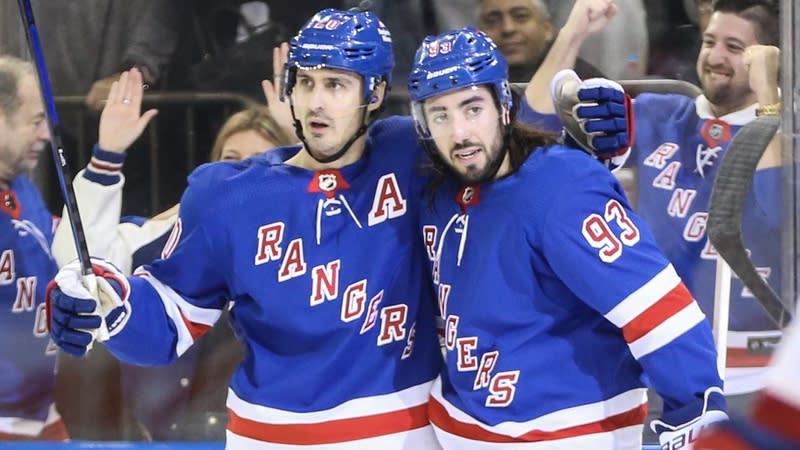 New York Rangers left wing Chris Kreider (20) celebrates with center Mika Zibanejad (93) after scoring a goal in the second period against the Montreal Canadiens at Madison Square Garden.