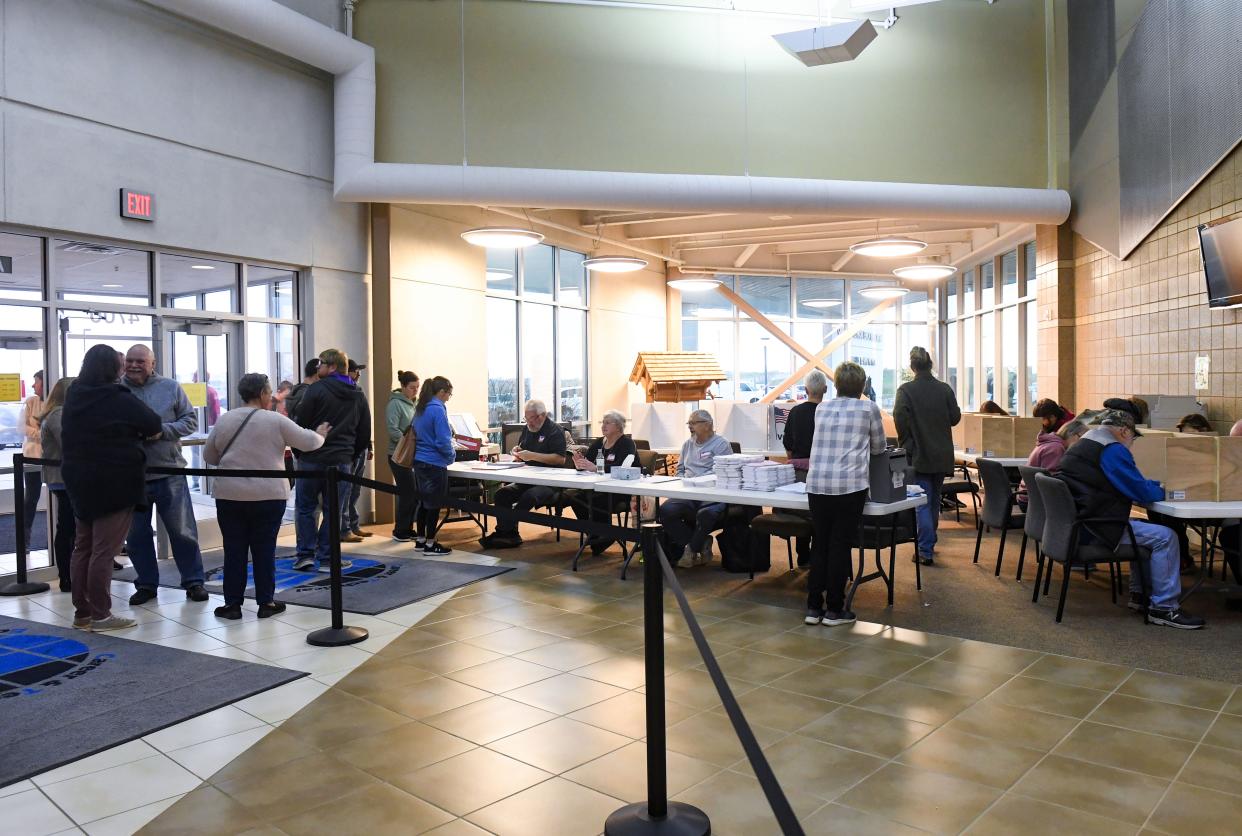 Voters wait in line to vote on Tuesday morning, November 8, 2022, at the Career and Technical Education Academy in Sioux Falls.