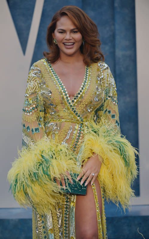 Chrissy Teigen arrives for the Vanity Fair Oscar Party at the Wallis Annenberg Center for the Performing Arts in Beverly Hills, Calif., on March 12. The model/TV personality turns 38 on November 30. File Photo by Chris Chew/UPI