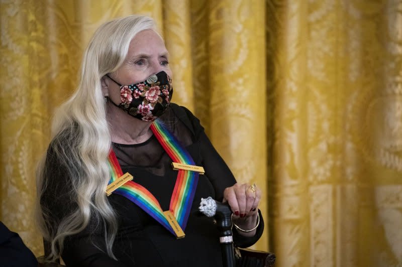 Joni Mitchell listens as U.S. President Joe Biden, not pictured, speaks during the Kennedy Center Honorees Reception in the East Room of the White House in Washington, DC in 2021. File Photo by Al Drago/UPI