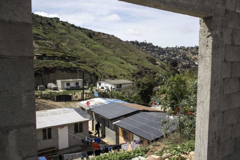 View of "Little Haiti," a neighborhood of some 40 houses, built for refugee families near the Embajadores de Jesus church, in the suburbs of Tijuana, Mexico on March 11, 2018.<span class="copyright">Guillermo Arias—AFP/Getty Images</span>