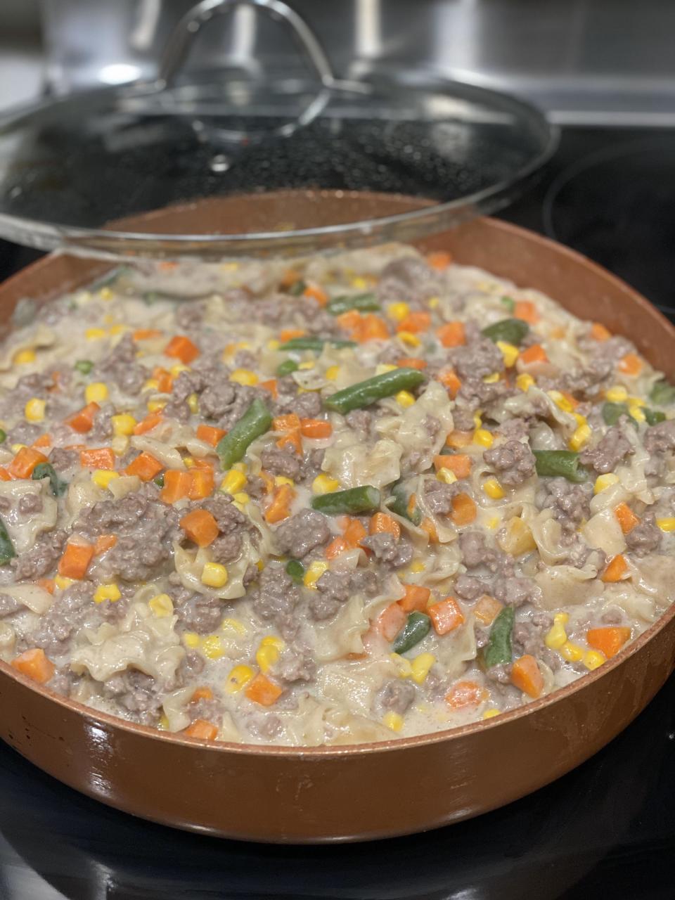 Hamburger helper skillet with mixed vegetables.