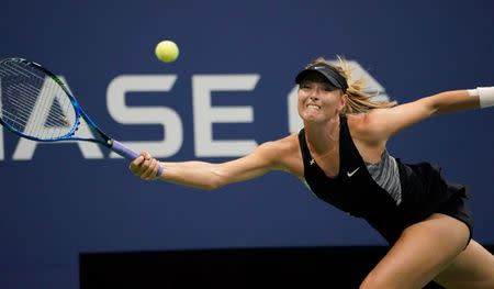 Sept 1, 2018; New York, NY, USA; Maria Sharapova of Russia hits to Jelena Ostapenko of Latvia in a third round match on day six of the 2018 U.S. Open tennis tournament at USTA Billie Jean King National Tennis Center. Mandatory Credit: Robert Deutsch-USA TODAY Sports