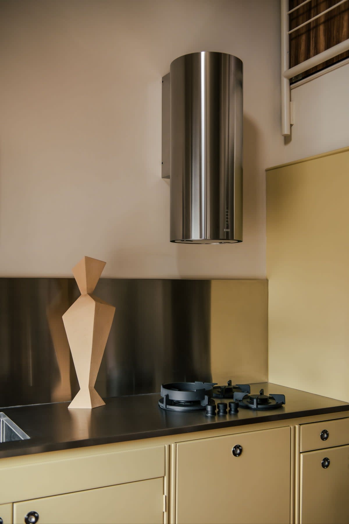 Hollie Bowden installed a stainless steel kitchen in this London apartment (Genevieve Lutkin)