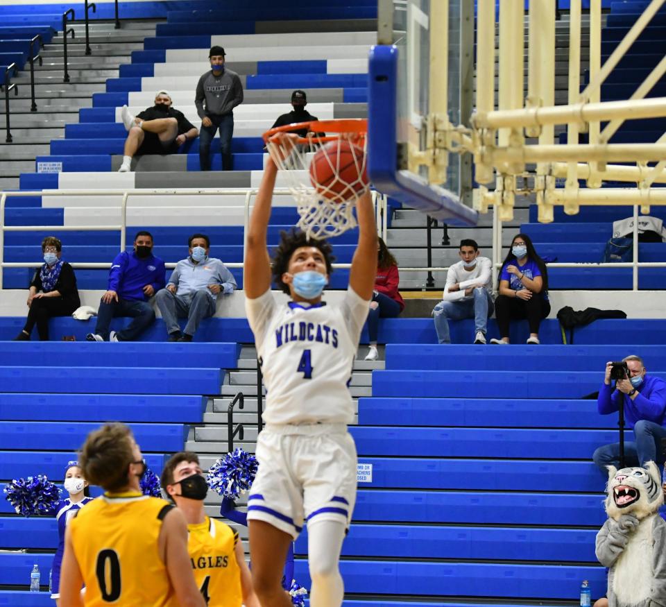 Sophomore Kadyn Betts slams through a dunk in the Wildcats' 48-39 win over the Eagles Monday, Feb.22 at Jim Ranson Court.