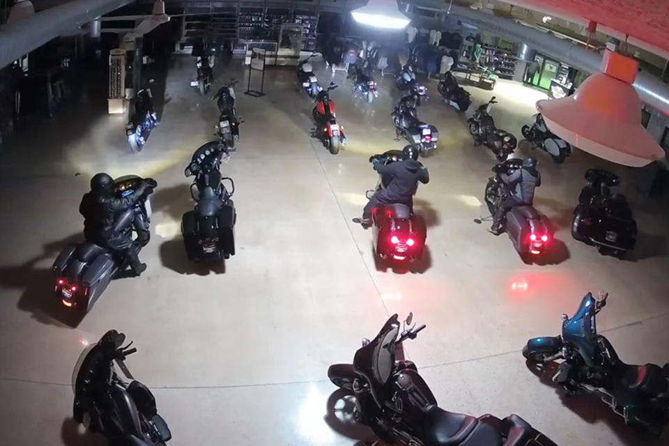 Surveillance video shows four suspects stealing Harley Davidson motorcycles in Kokomo, Ind. (via Kokomo Police Department)